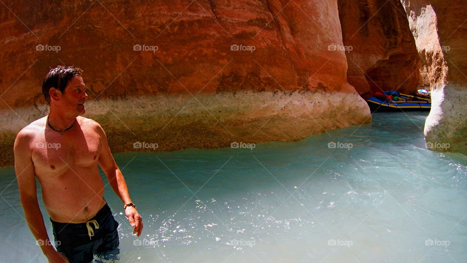 Man standing in lake