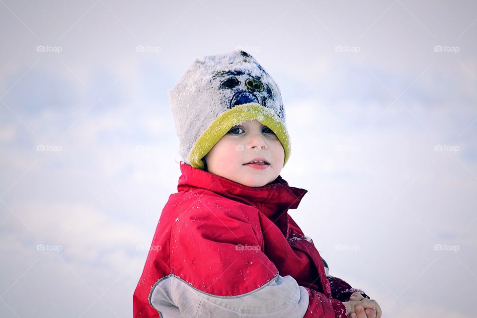 Cute boy wearing knit hat