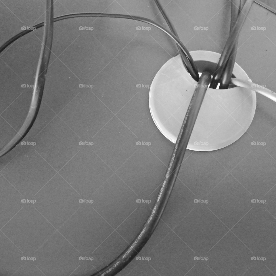 round hole for cables on a working desk