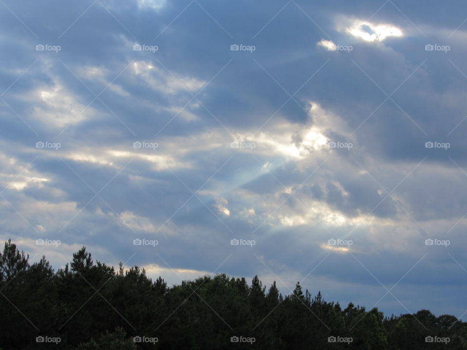 Rays of sunshine breaking thru the clouds