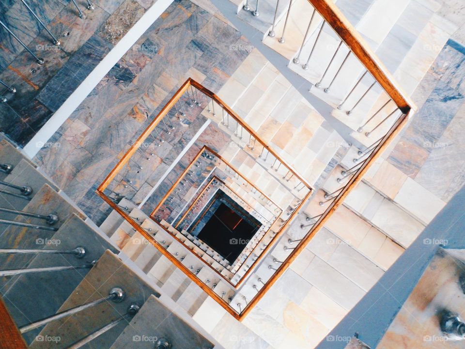 square spiral staircase in the building