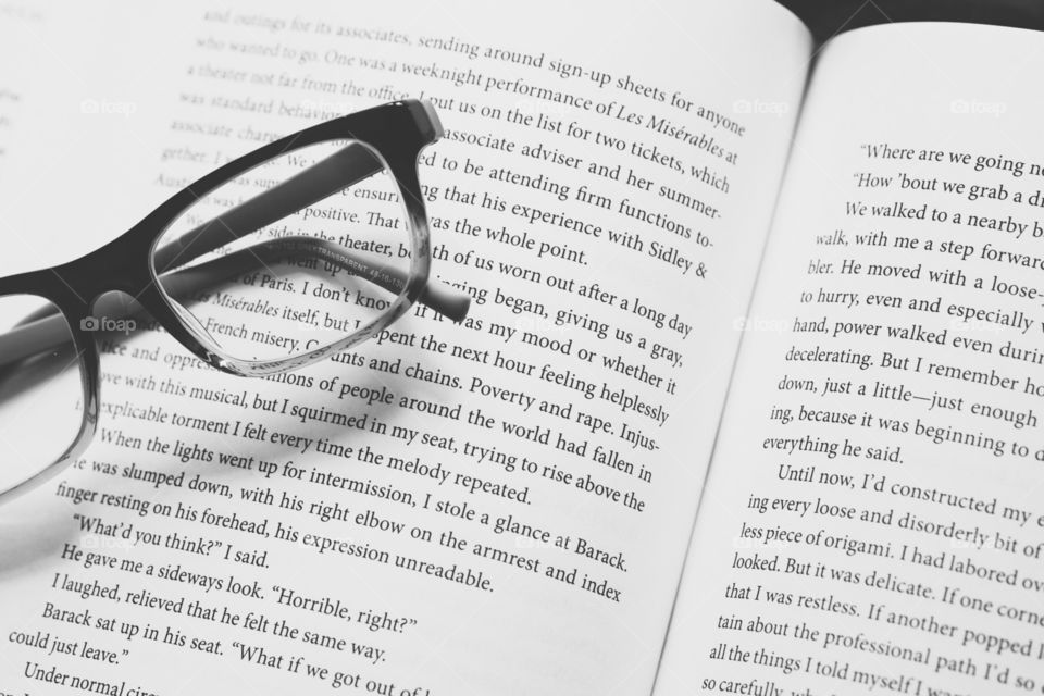 Reading As A Hobby, Reading A Book, Glasses With Book, Monochrome Image, Relaxing Hobby, Learning From Your Hobby, Text, Open Book, Open Book With Glasses, Becoming By Michelle Obama 
