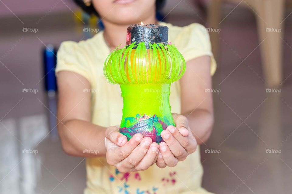 Candle holder made of used plastic bottle.Go green.