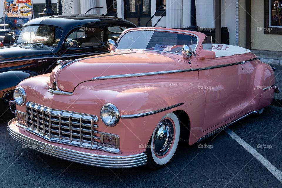 Vintage pink car cabriolet outdoors