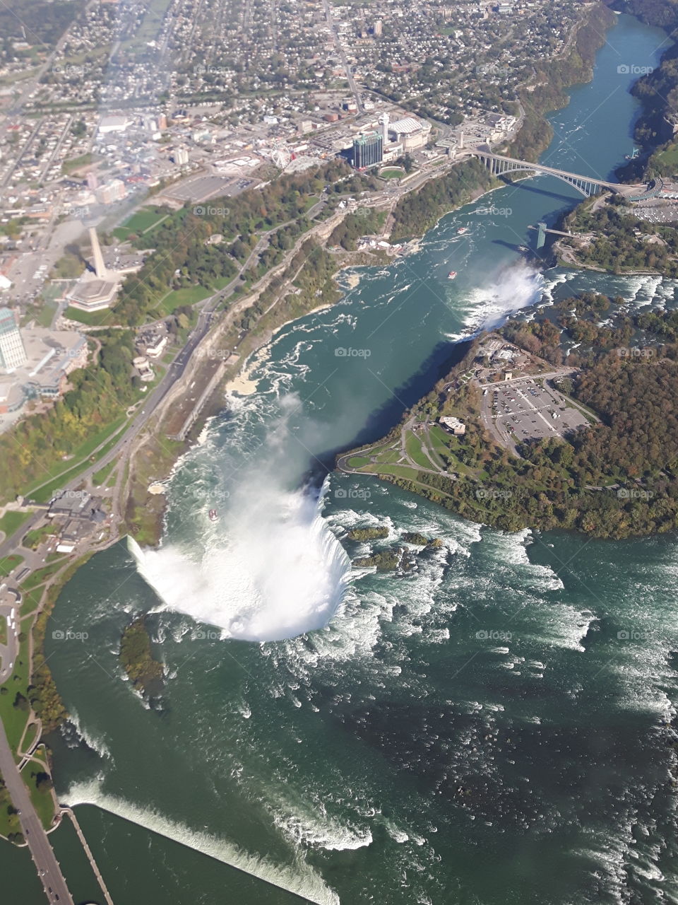 high in the sky hellacopteride over Niagara falls