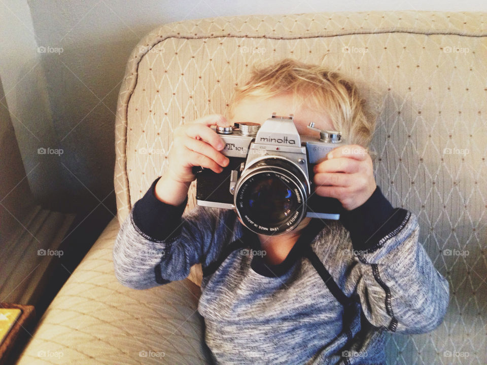 Little Boy Taking Pictures