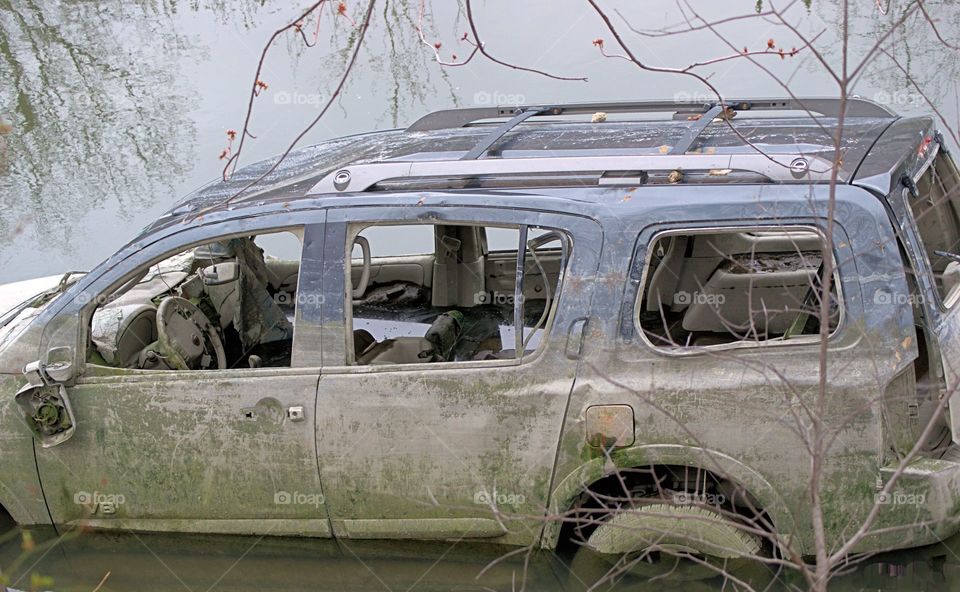A vehicle submerged in water in The Bronx, New York City.
