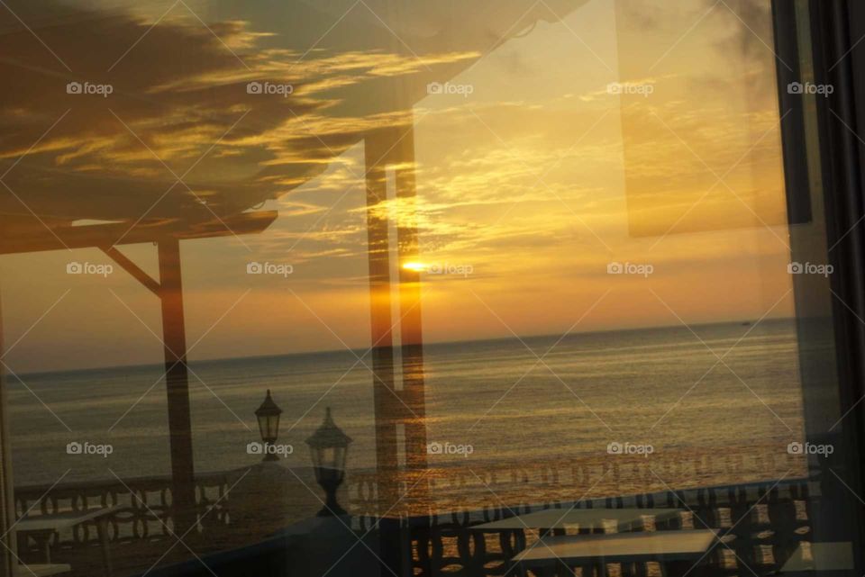 Window#reflect#seaview#sunrise#clouds#sky#colors#terrace