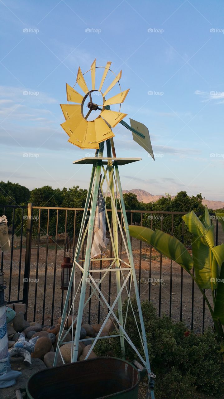 windmill. an old windwill decoration in the yard 