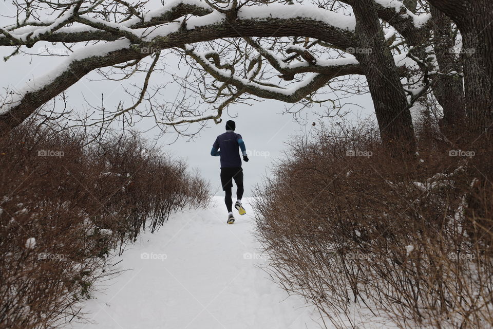 Chilly weather and fresh snow on the ground won’t stop this enthusiastic runner - his  motivation is bigger than cold