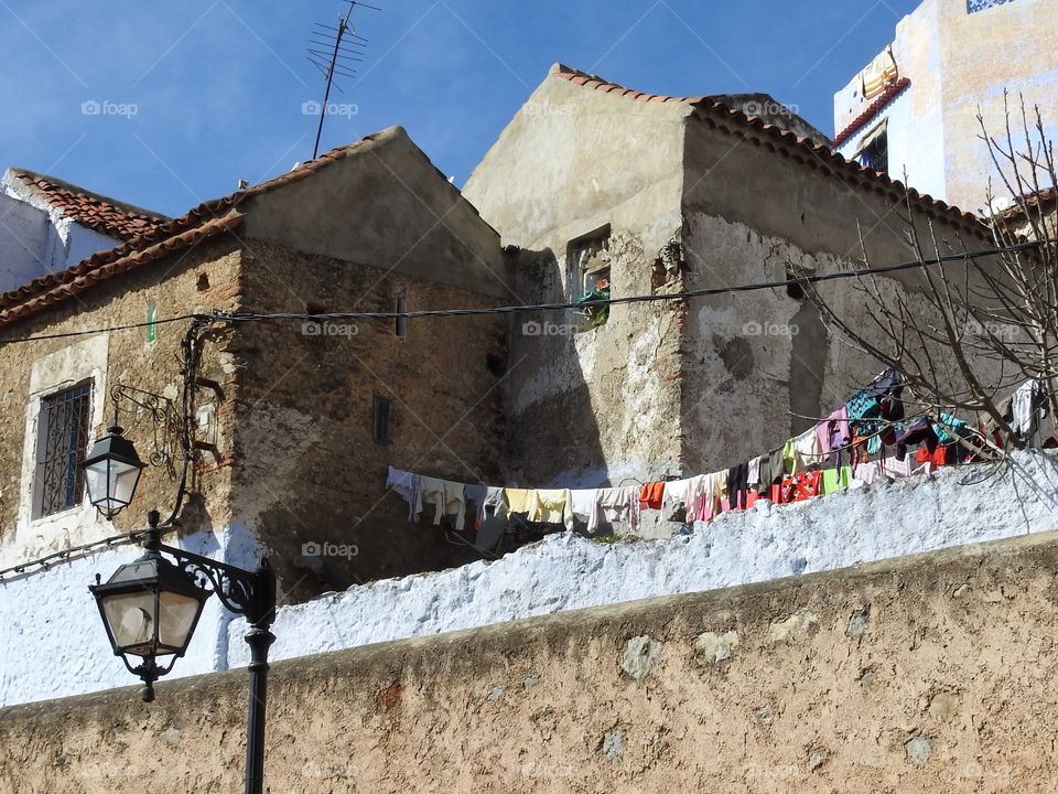 Clothes drying outside old house