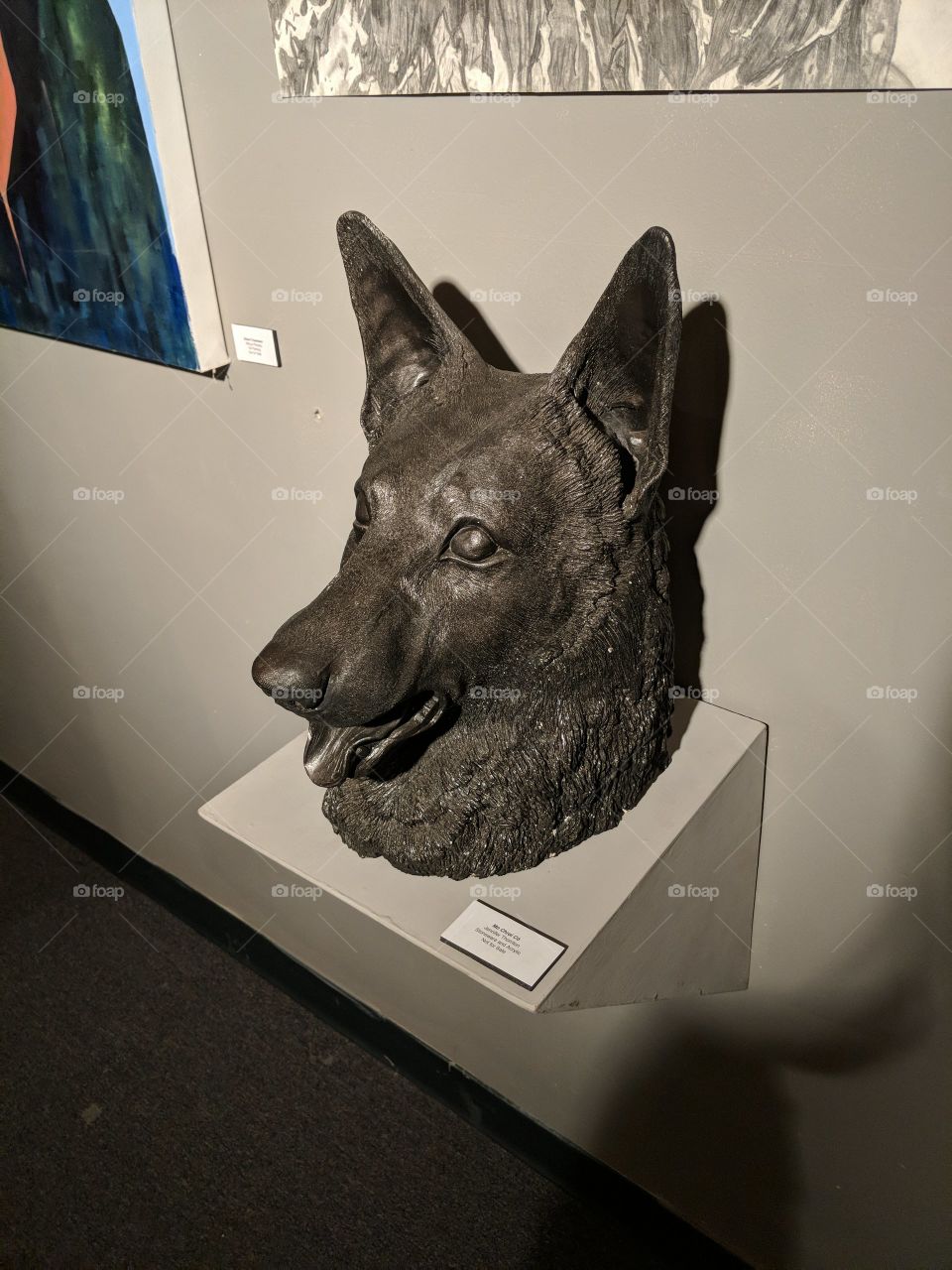 A bust done by a colleague, out of multiple metals, used at a student run juries art exhibition, where the school is currently battling cutting fundamental humanities majors and minors.