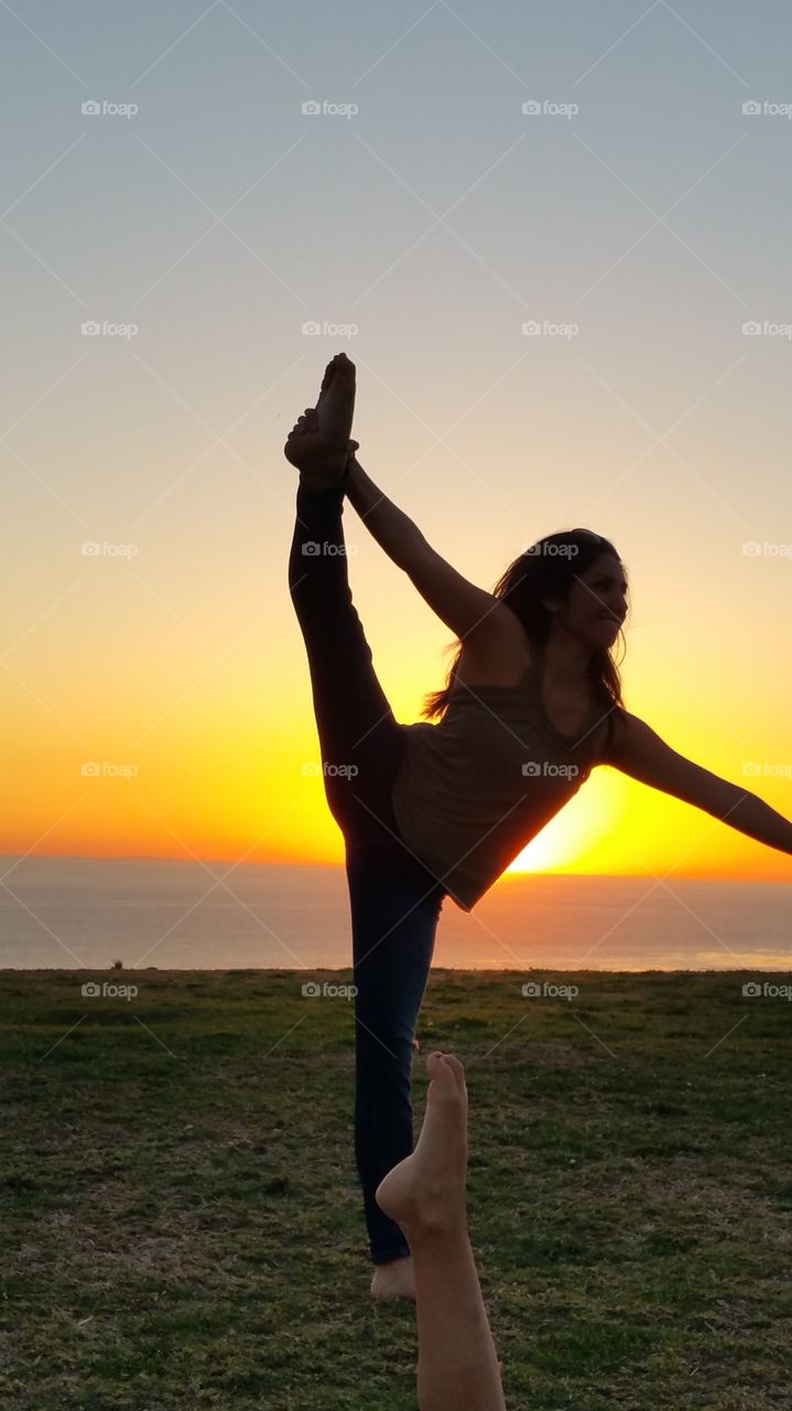 dance pose at sunset