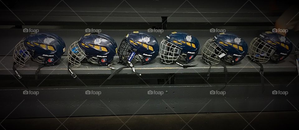 Line of hockey helmets