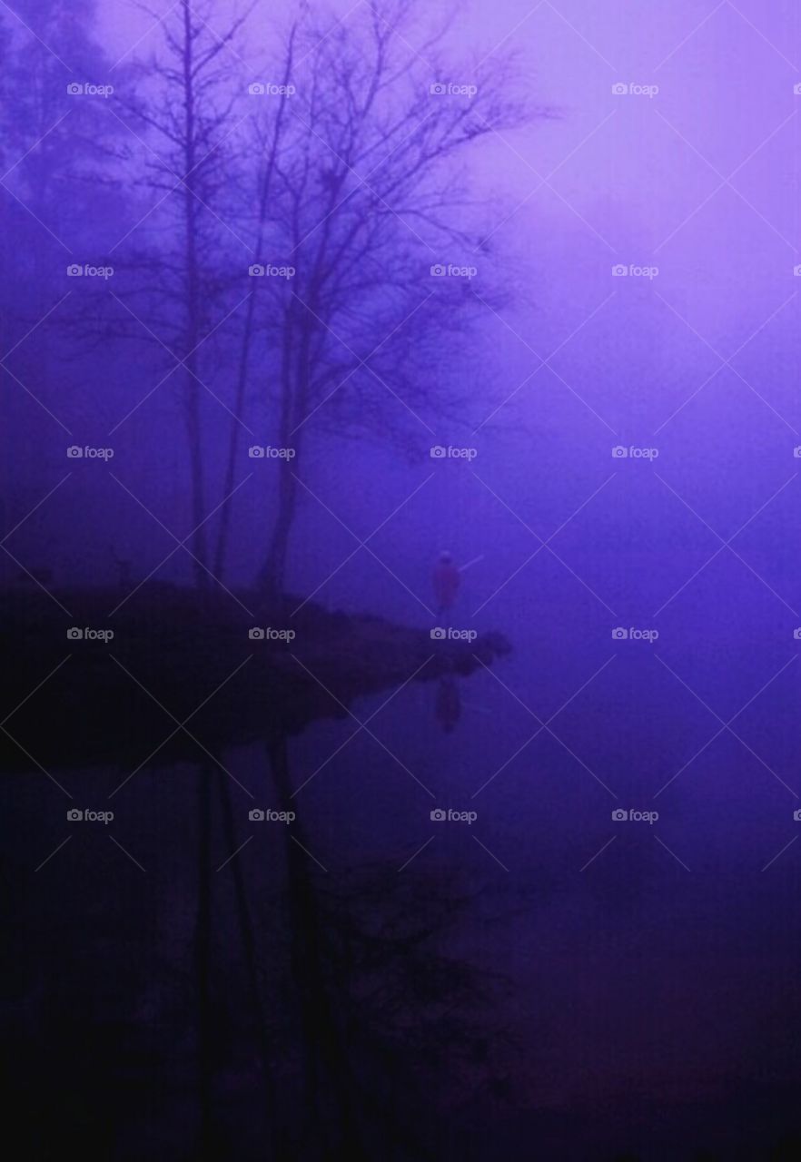 foggy morning fisherman