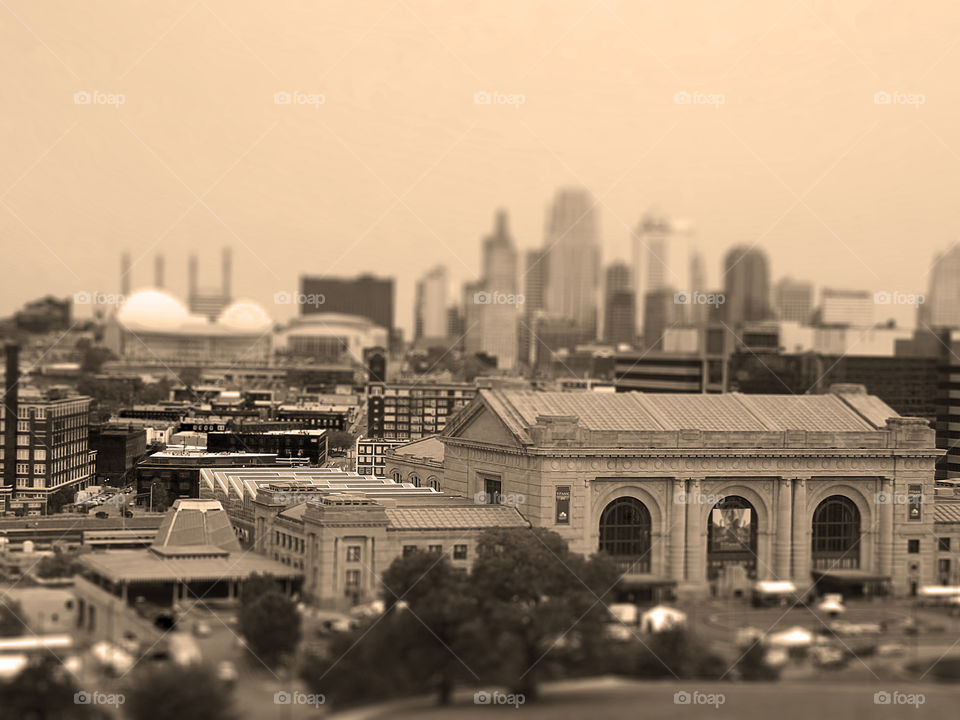 Sepia Union Station, Kansas City. I used a sepia tone and tilt shift effect to create a miniature, vintage look.