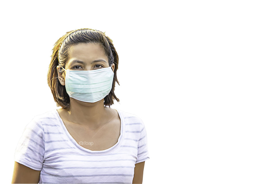 Isolated Asean Woman wear a mask to prevent dust on a white background with clipping path.