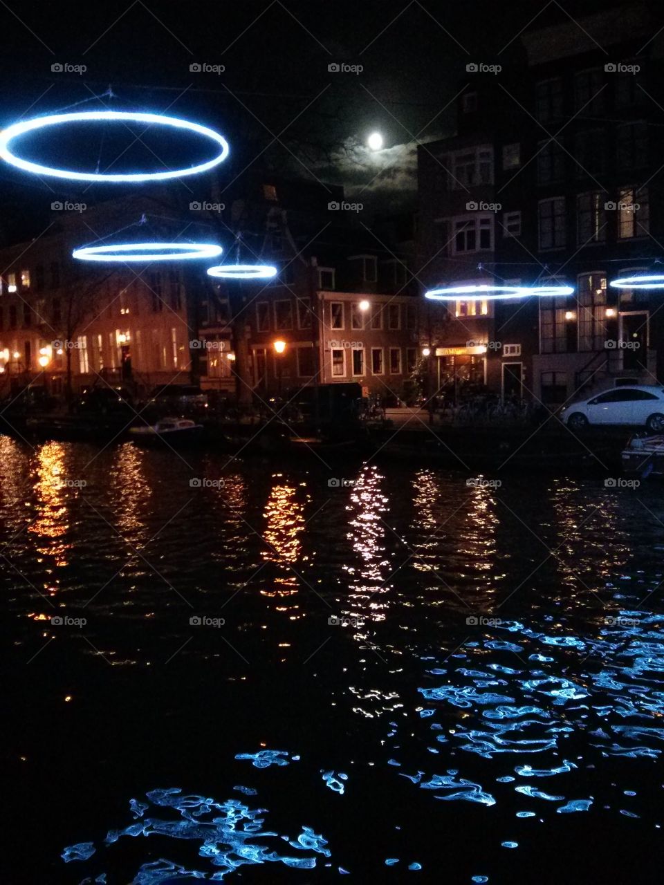 Reflections in moonlight over Amsterdam canals