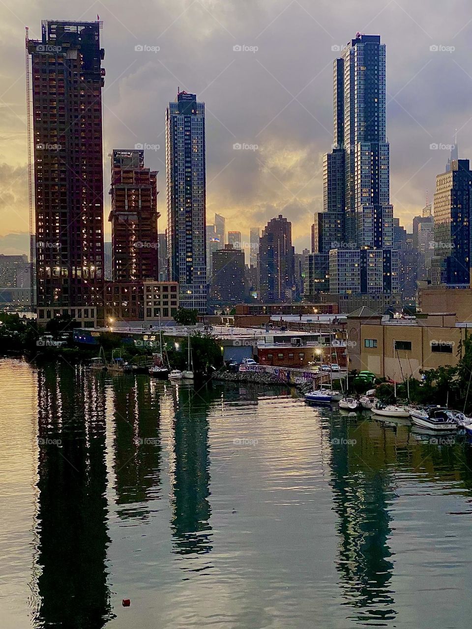 This beautiful cityscape by the ocean comes to us from „Newtown Creek“ in LIC, Queens seen from the „Pulaski Bridge“ that I frequently cross on my way home from „Brooklyn“. 2023. Hypnotic Productions