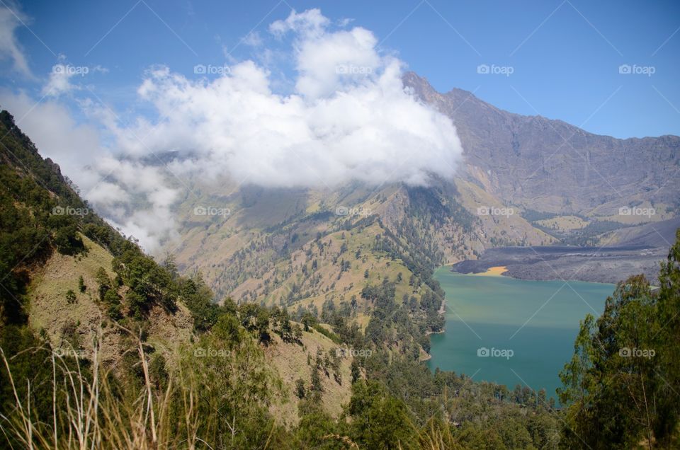 Beautiful nature background Segara Anak Lake. Mount Rinjani is an active volcano in Lombok, indonesia. Soft focus due to long exposure.