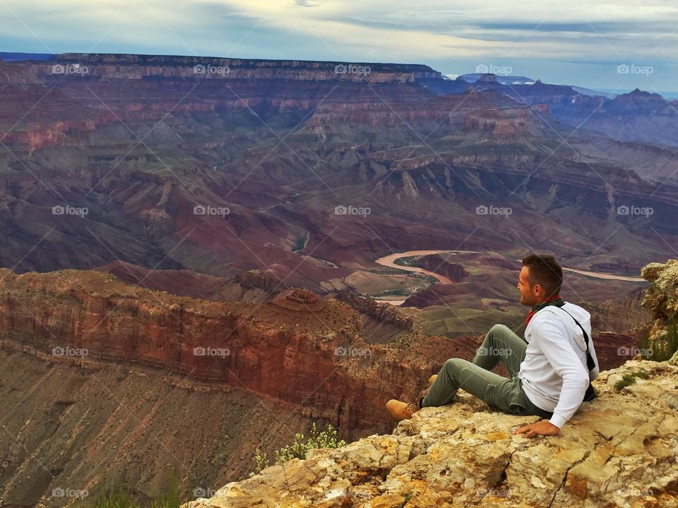 Man looks the beautiful Grand canyon's land