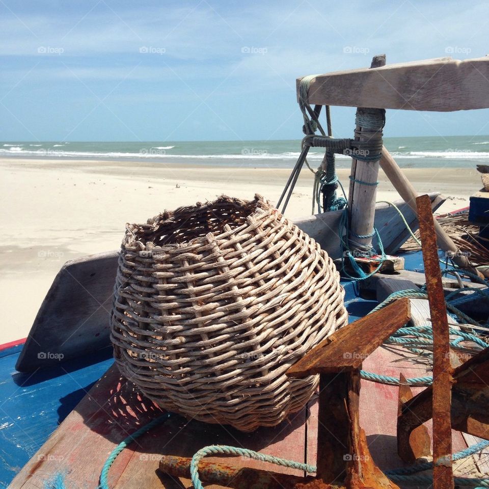 A basket in a Brazilian boat. This is a everyday scene in a Brazilian beach