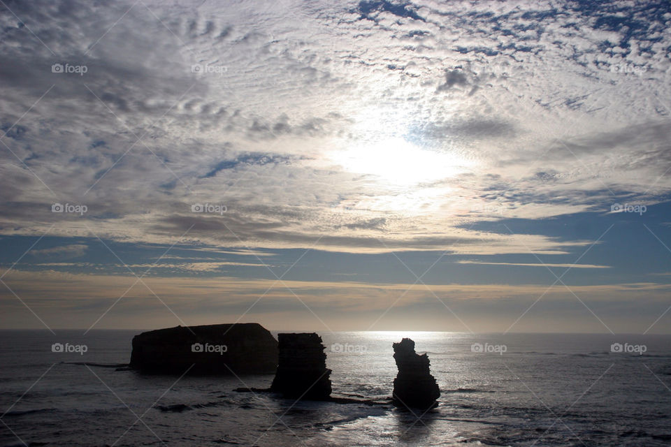 beach sunset clouds stones by kshapley