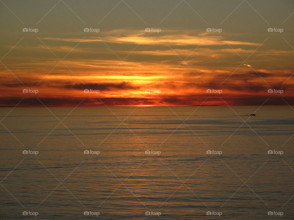 ocean sunset clouds water by ameviepix