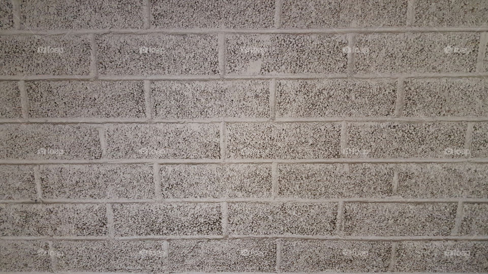 White grey brick wall 