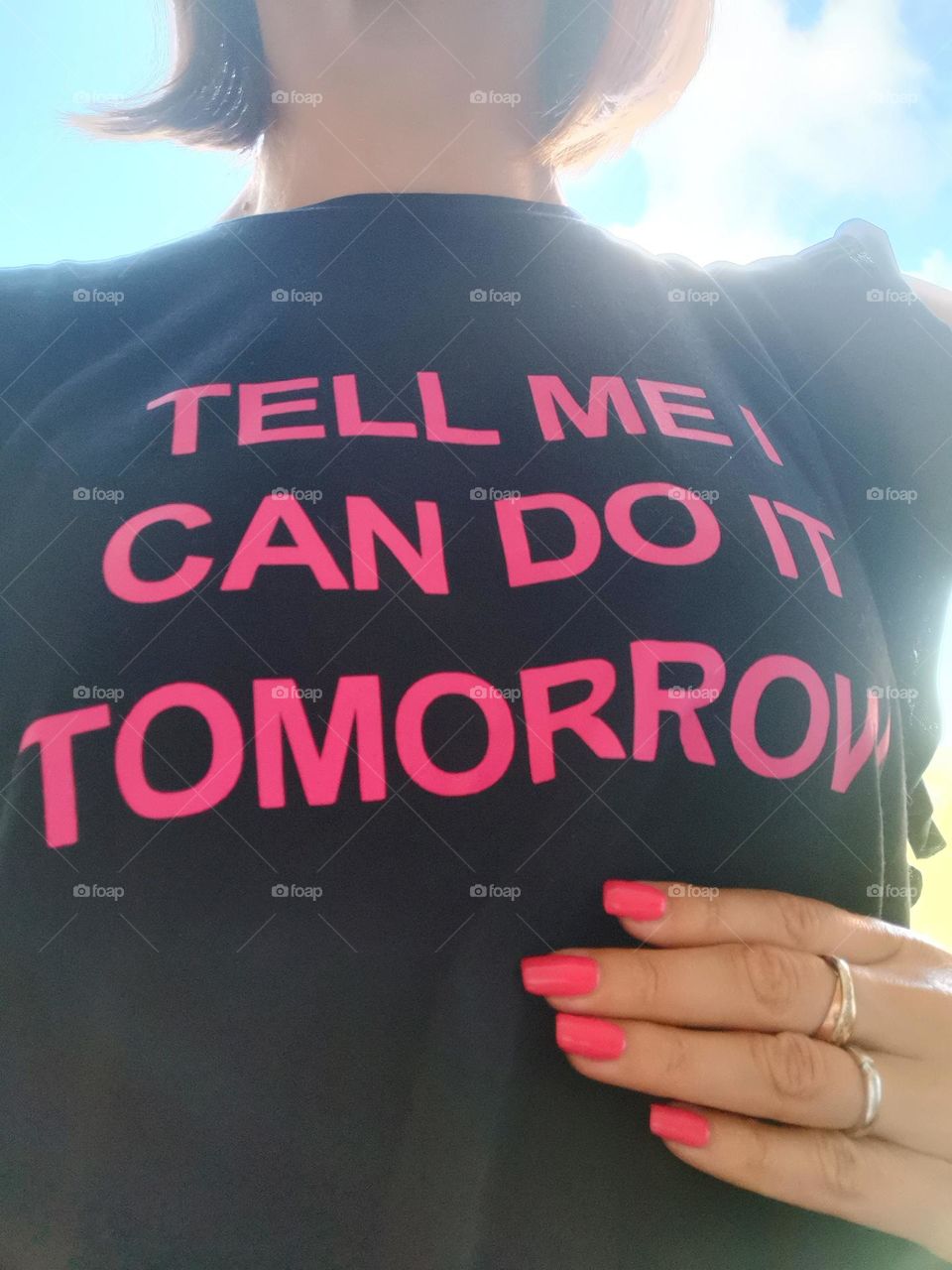 "Tell me I can do it tomorrow..." Pink nails, pink words.