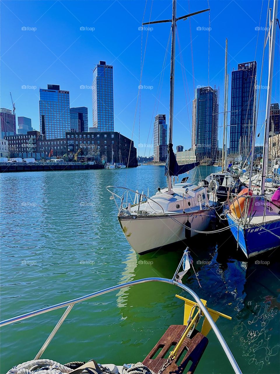 This is “Newtown Creek” by the “Pulaski Bridge” seen from aboard “Salvation”, the “28 foot 1969 Luhrs” cabin cruiser that I and my longtime partner “Timothy Trespas” call home on a bright sunny afternoon in February 2024. Hypnotic Productions