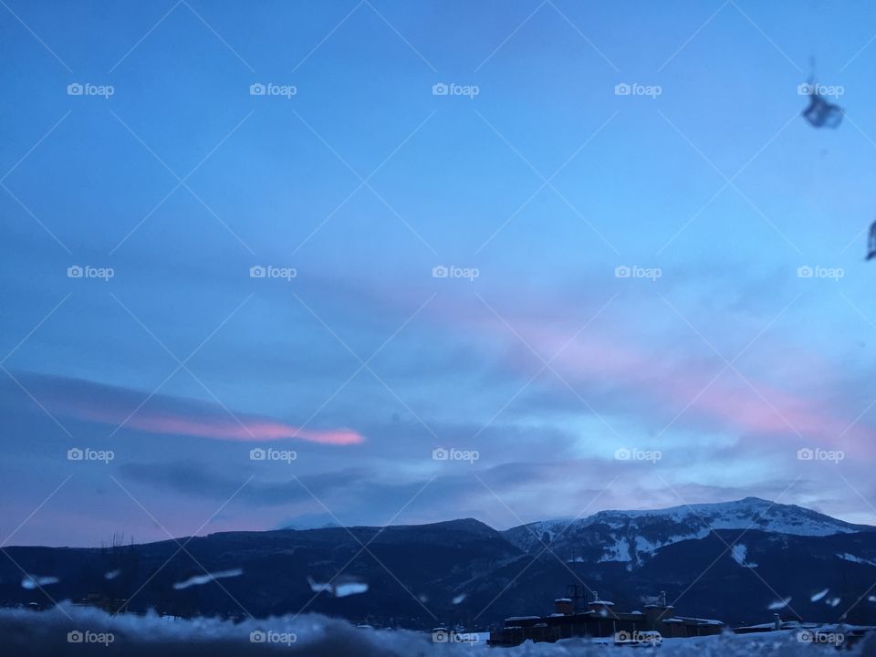 Sunset over winter hills