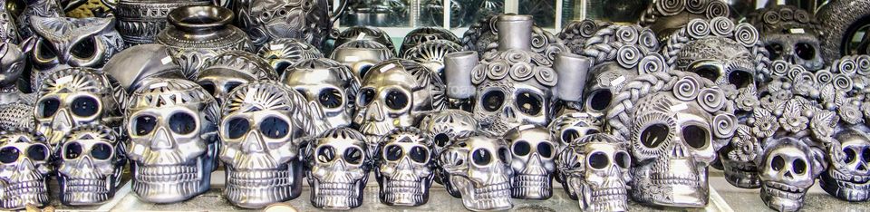 Metallic Mexican skulls.