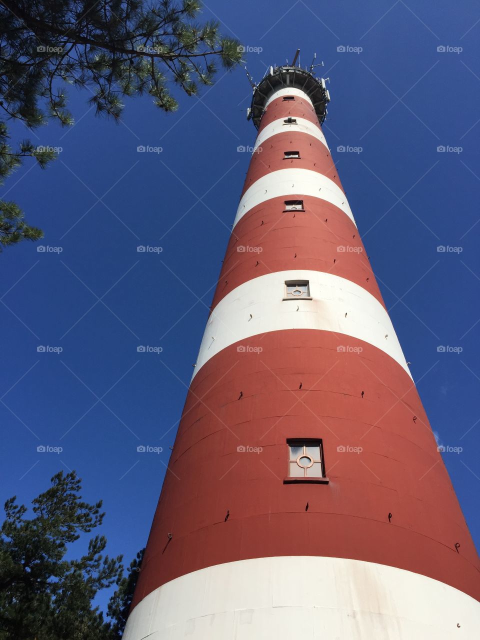 Leuchtturm Holland Niederlande klarer Tag Farben rot weiß blau Höhe Urlaub Ferien See Meer Ozean Abenteuer 