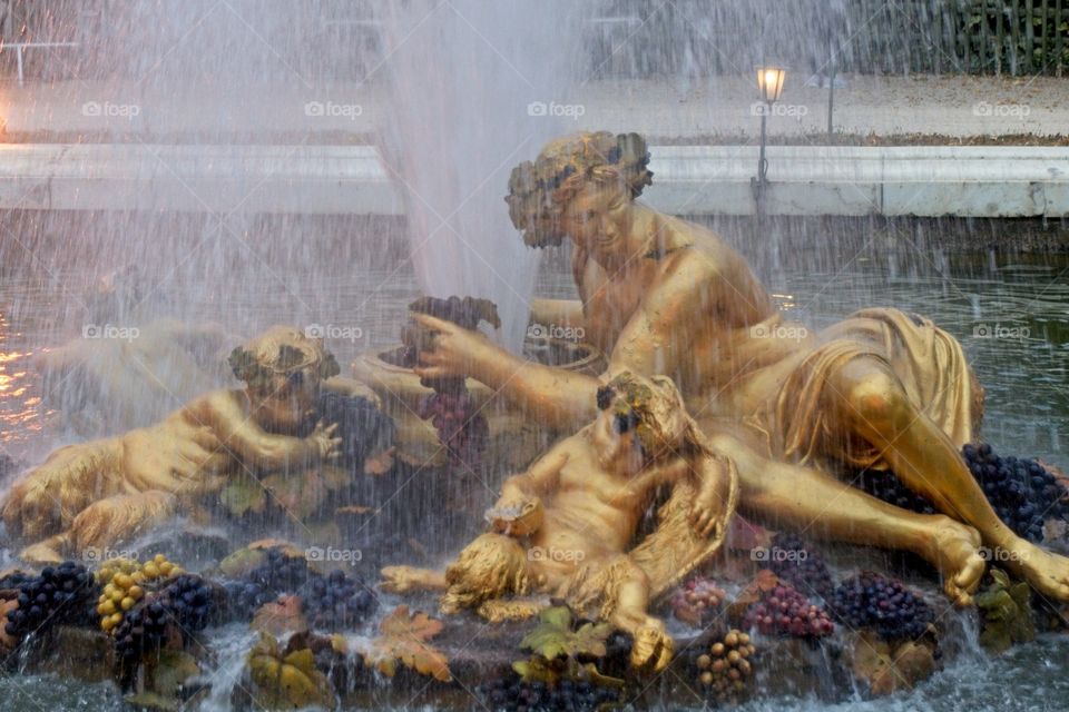 statue of a person in a garden