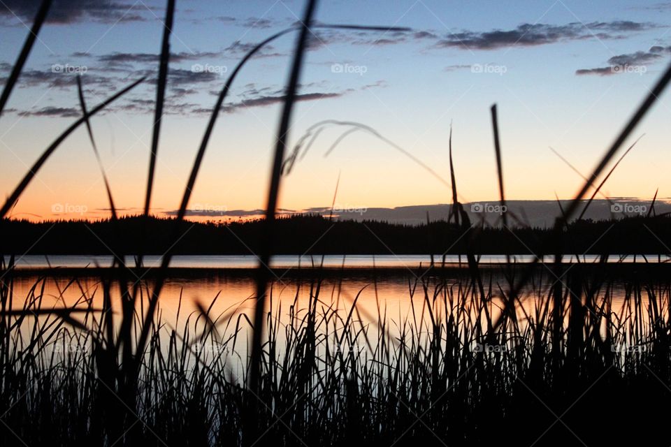 Scenic view of a lake during sunset