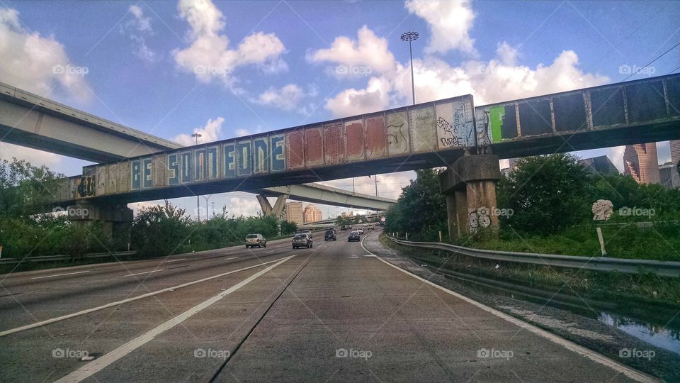 Be someone . A message by graffiti in down town Houston on a bridge 