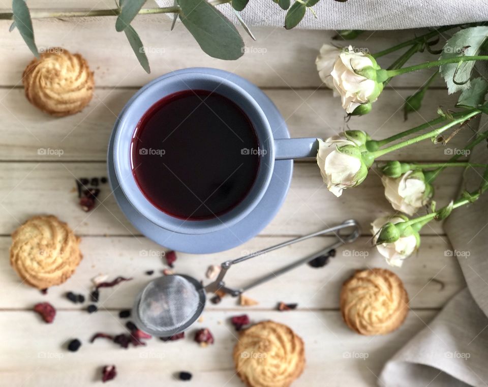 High angle view of coffee cup and cookies