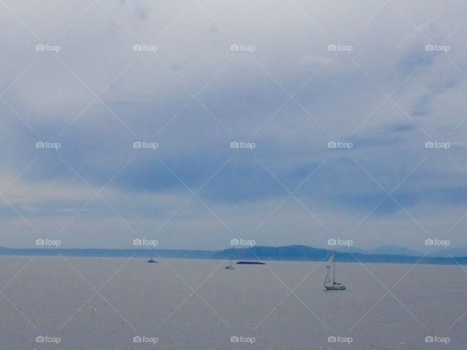 Partially Cloudy. Puget Sound sailboats