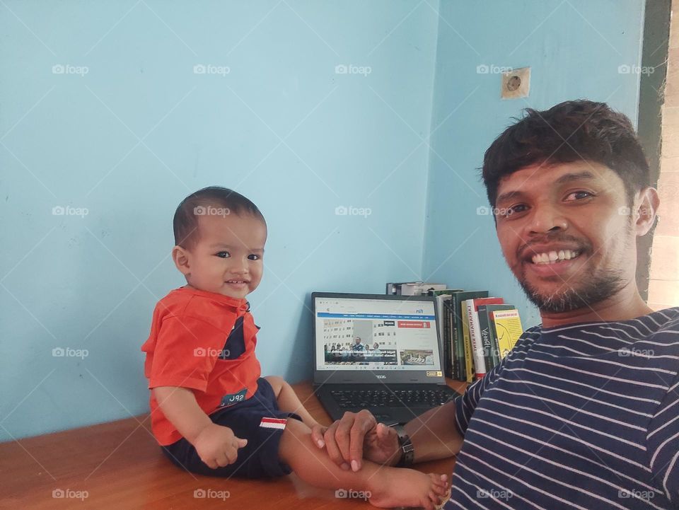 Father and son selfie smiling