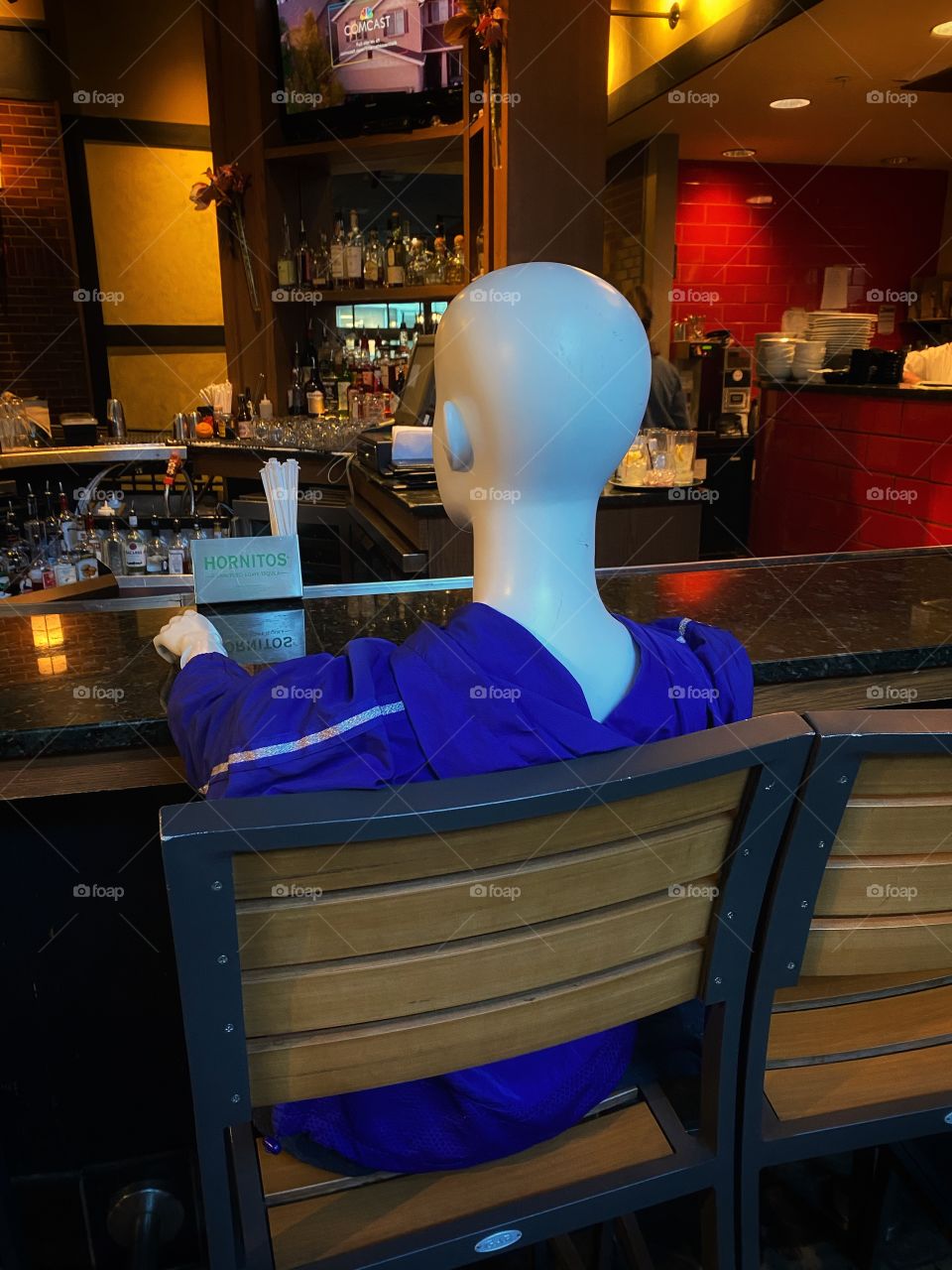 I’ll take a beer - mannequin sits at a bar to keep patrons separated during COVID 19 pandemic 