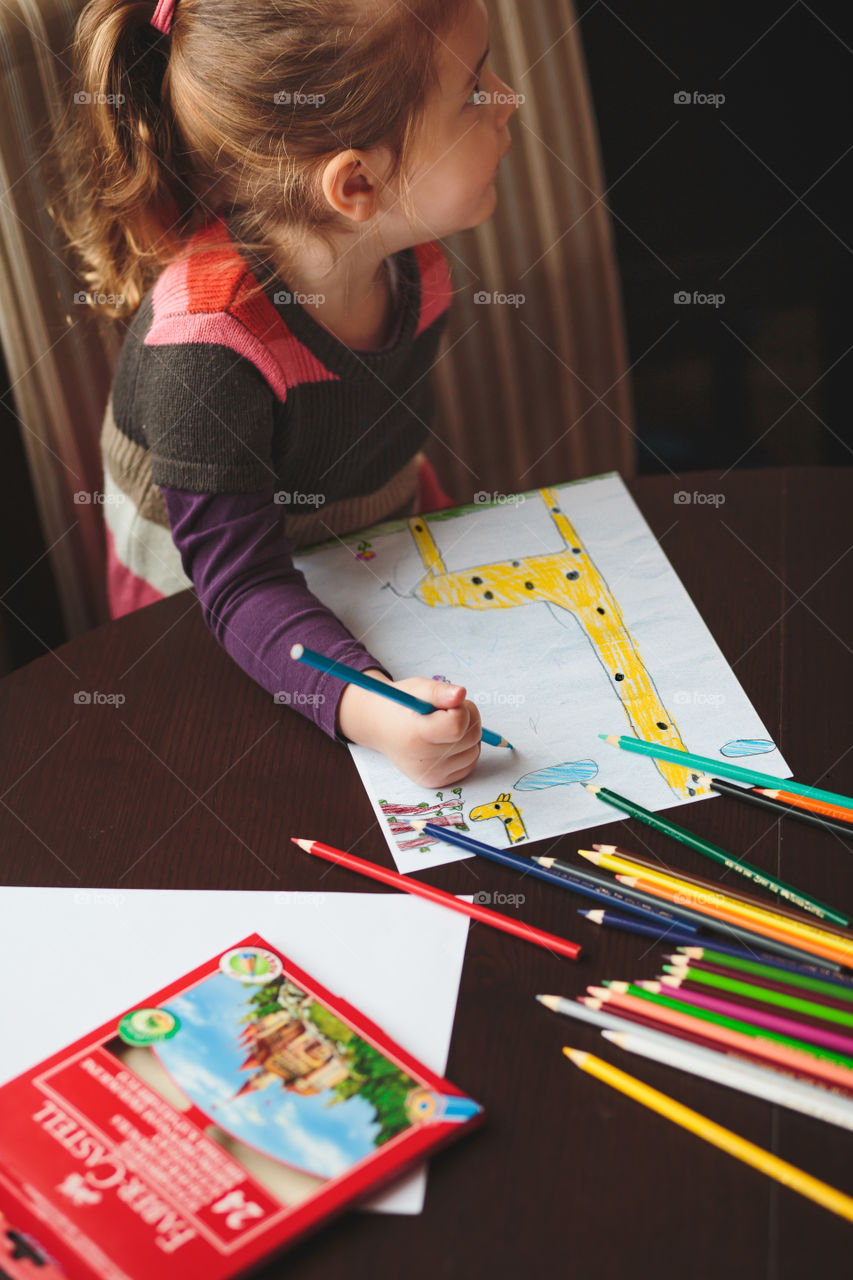 Colours of the world. Children with mom drawing using crayons