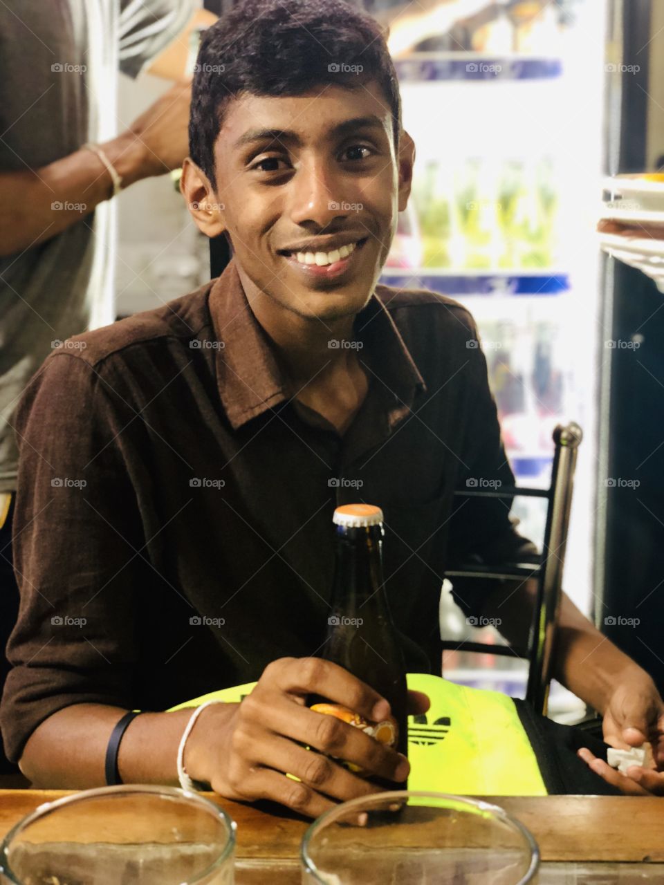 Drinking soft drinks. With smile. Bright photo. Colorful pic. Bright effect. Enjoy. 