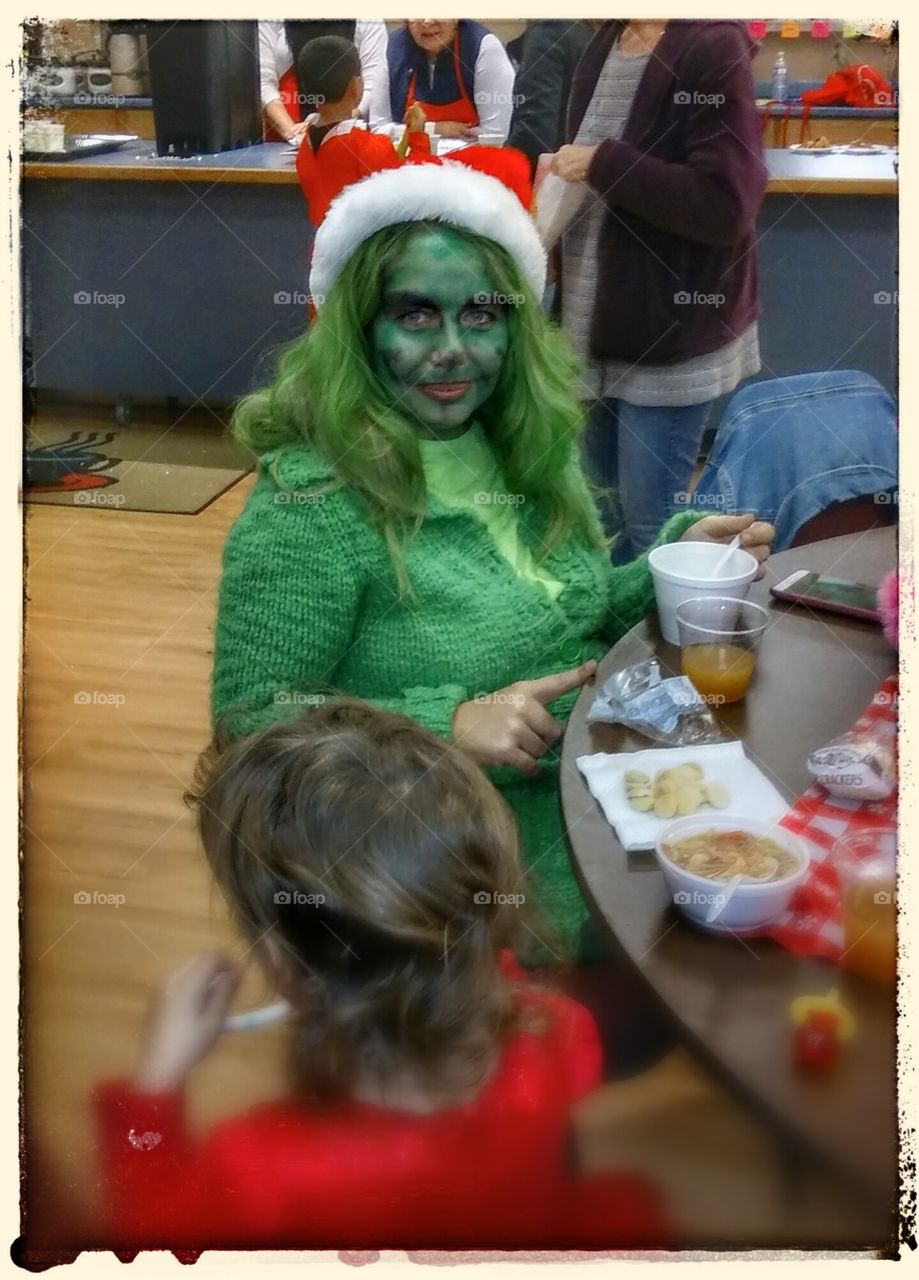 Lady Grinch?. she was very green including her hair.