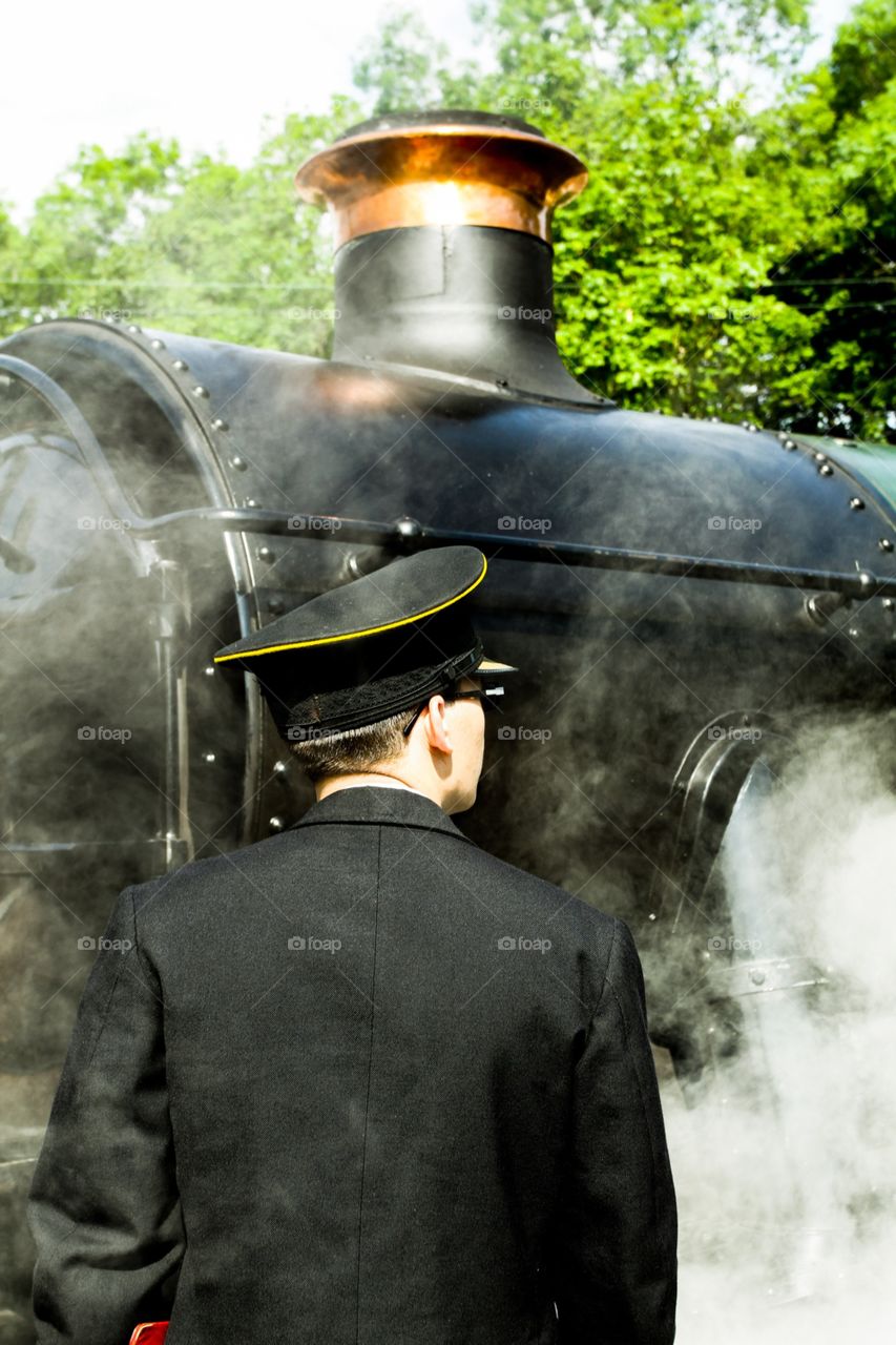 Train conductor and steam train