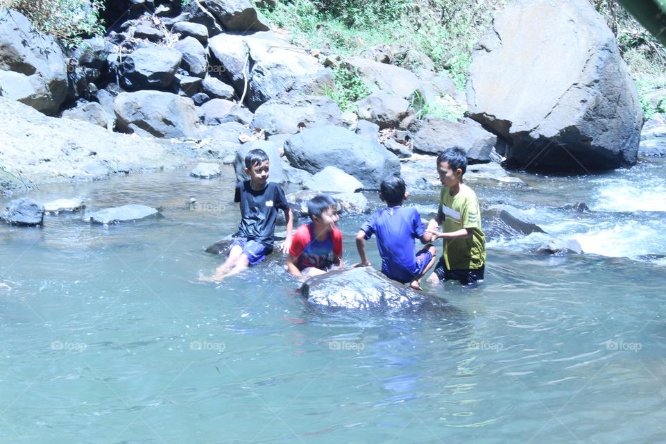 playing in the river