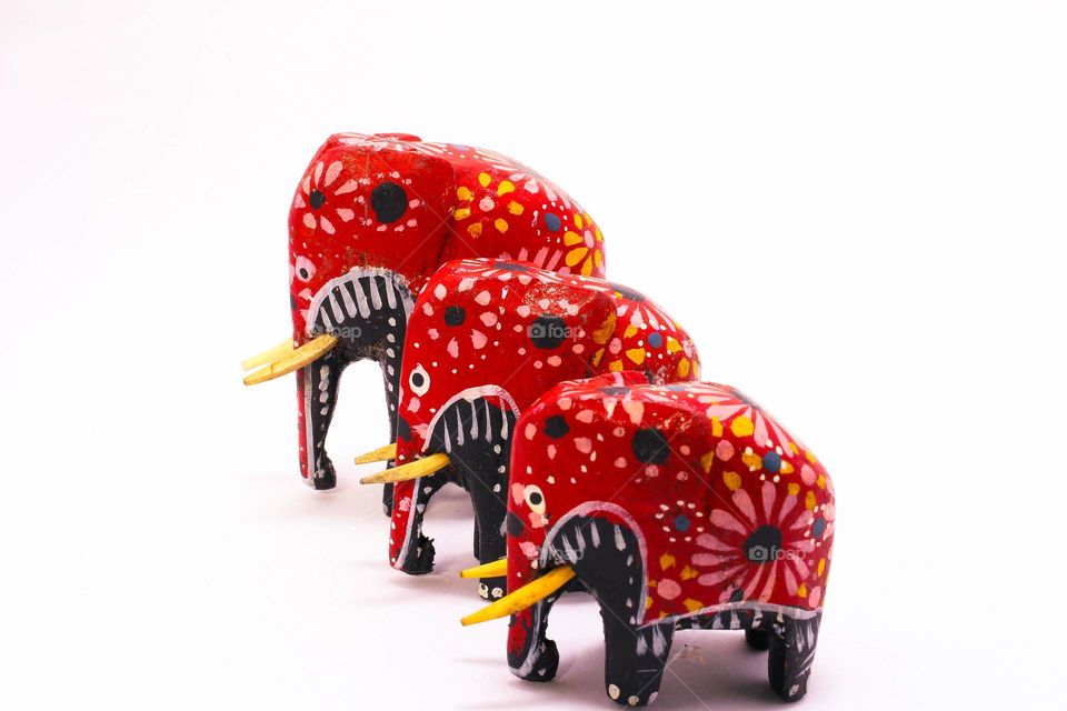 Colorful wooden elephants