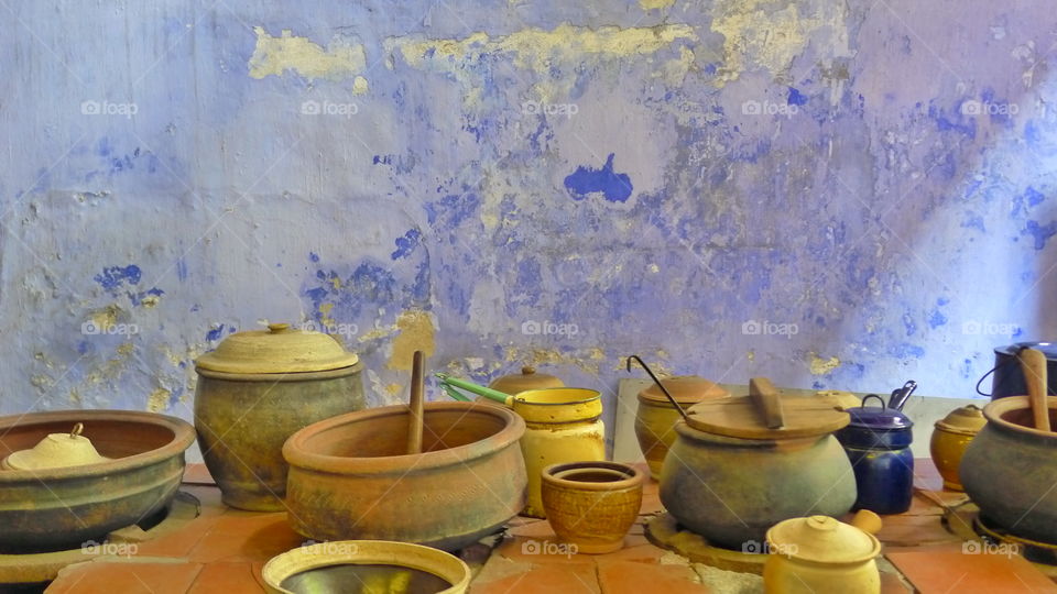 Pots in Front of Blue Wall