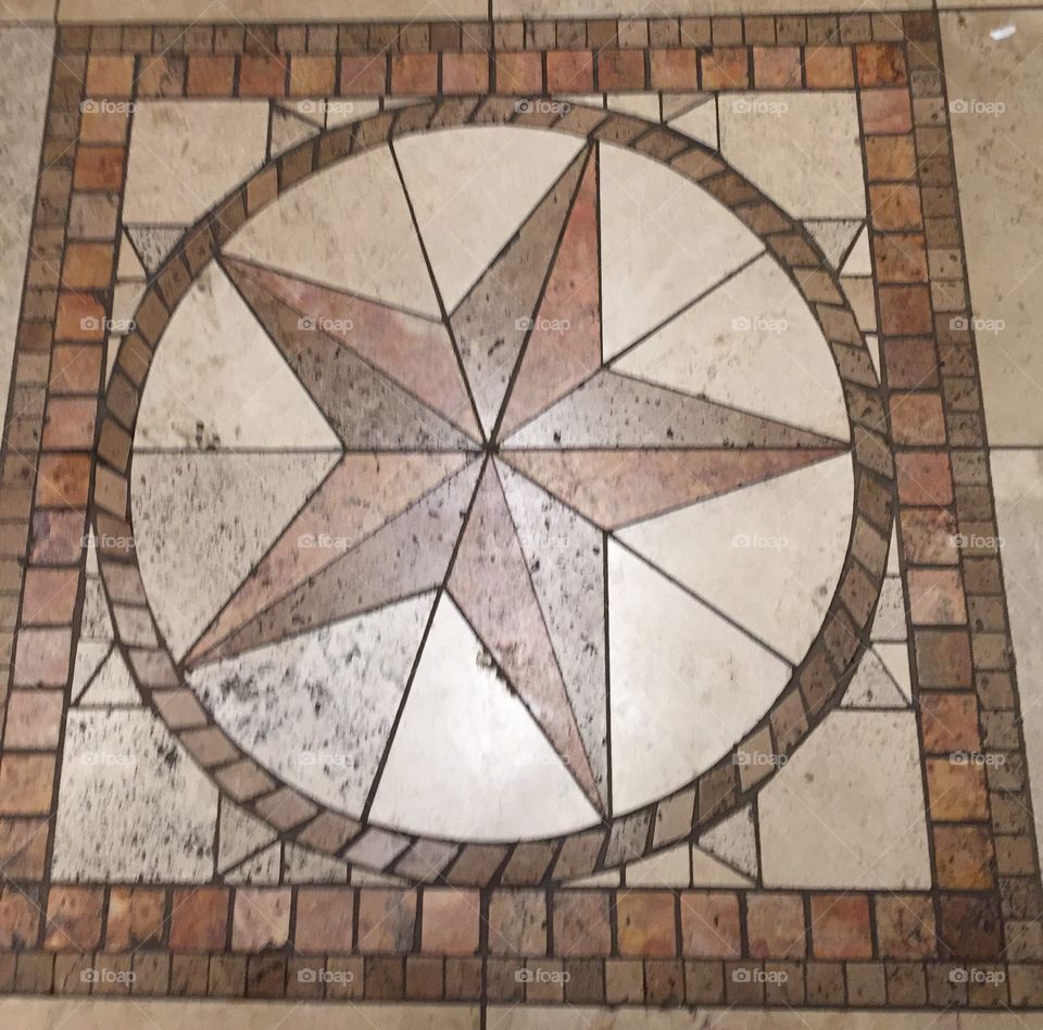Texas star on the floor of the elevator 