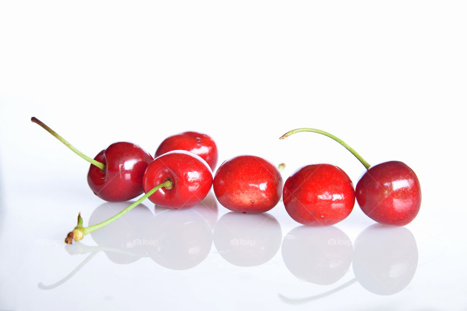Cherry fruit against white background